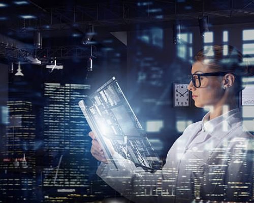 Young woman scientist using tablet pc in her hands. Mixed media